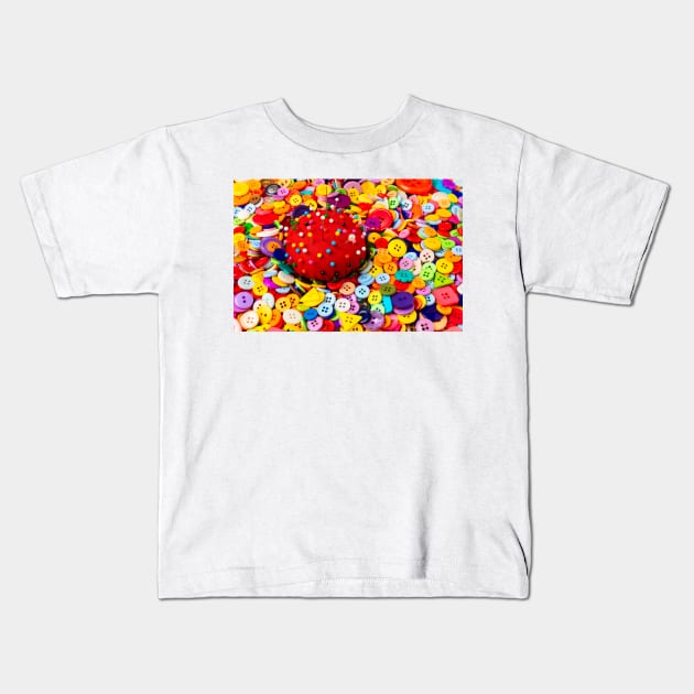 Pile Of Buttons And Red Pincushion Kids T-Shirt by photogarry